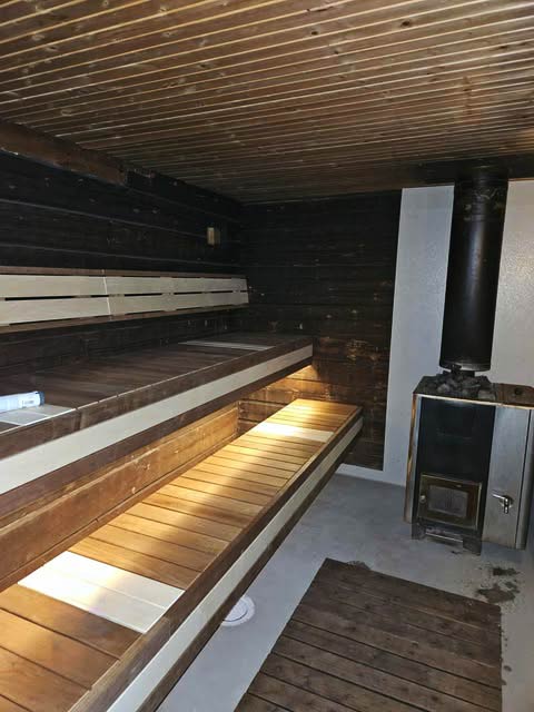 Traditional wood-fired sauna interior